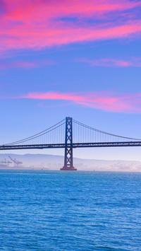 San Francisco Bay bridge from Pier 7 sunset in California