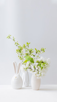 Spring Flowers in a Vase on a Light Background
