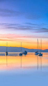 A sunrise with high - cloud reflections on Brisbane Water