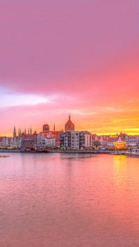 Amazing sunset in Gdansk reflected in Motlawa river, Poland