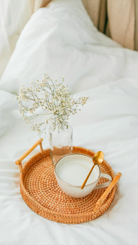 Breakfast in bed, cappuccino, wicker tray,home decor