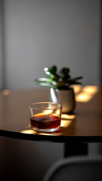 Black filter coffee on the table in cafe glass cup