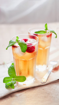 Refreshing Summer Drink with Syrup, Raspberry, Mint and Ice