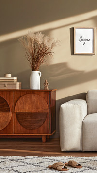 Living Room with Stylish Sofa, Coffee Table, Dired Flowers