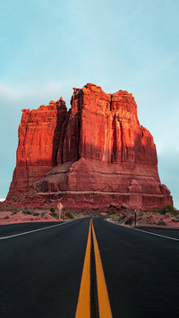 A Road Leads to the Red Rocks of Courthouse Tower