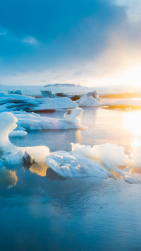 A floating iceberg at sunset