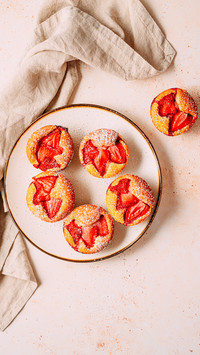Strawberry muffins, friands on plate top view