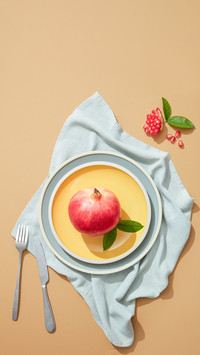 Minimal Flatlay of Ripe Pomegranate