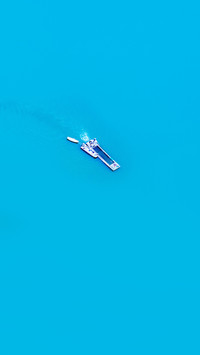 Ships on the water surface in aquaculture areas