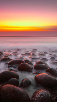 The pebbles by the stream lie quietly