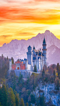 Famous Neuschwanstein castle in Germany during sunset