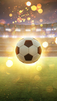 A football speeding on the field