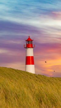 At sunset, the lighthouse on the island of Sirte