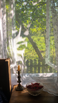 Open window in a vintage countryside cottage