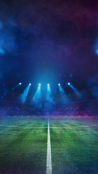 Textured soccer game field in neon smoke