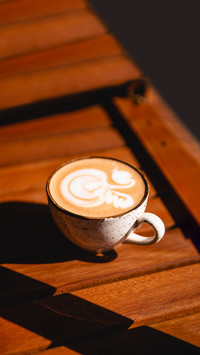 Coffee cup with cream or milk