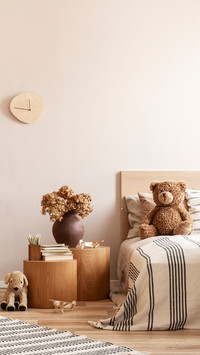 Peacock Chair with Pillow &amp; Teddy Bear Next to Nightstands
