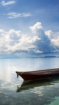 A small boat on the sea surface