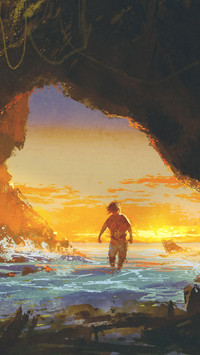 the man walking in the sea cave at sunset