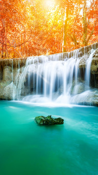 Beautiful Colorful Waterfall in Autumn Forest