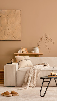 Warm and cozy living room interior with modular sofa