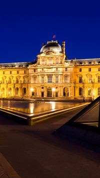 Louvre museum at dusk paris france