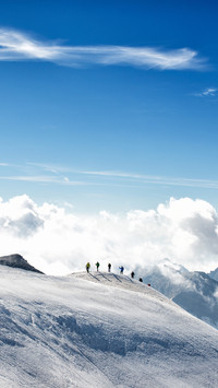 Climbers climbing the mountain with mountain equipment