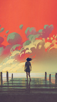 A girl standing by beach with beautiful cloud