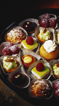 High angle view of various types of sweets on a plate