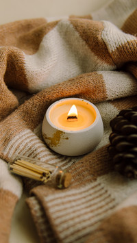Interior candle in a plaster candlestick