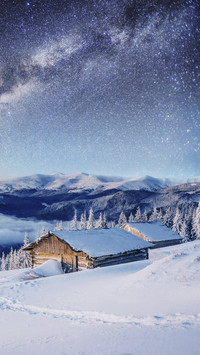 Village in Snow under Milk Way