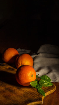 Orange on neutral background in low key