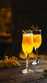 Cocktails multi fruit with ice drops in the glasses
