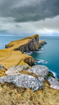 Dark and moody clouds over Neist Point