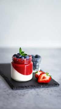 Coconut panna cotta with strawberry sauce