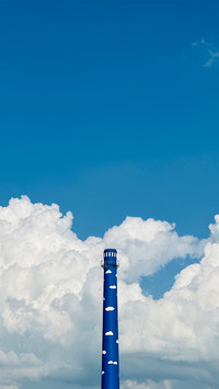 The chimney under the white clouds