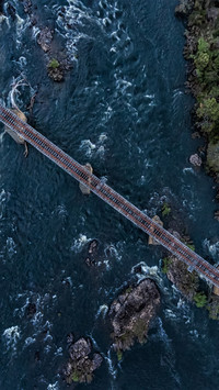 Abandoned railway tracks on the river