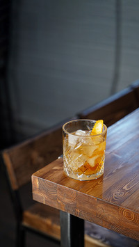 Classic old fashioned cocktail with bourbon