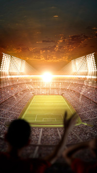 A football field filled with cheers from fans