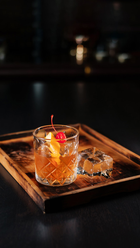 Negroni cocktail with lemon zest preview