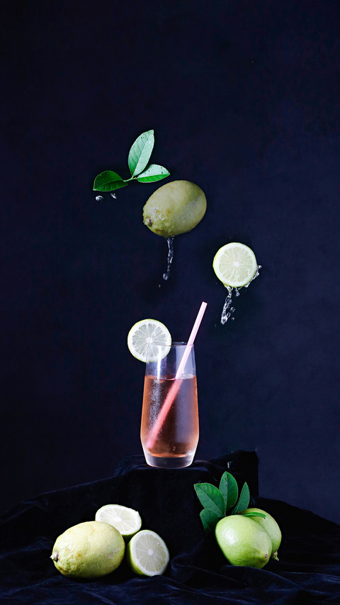 Lemon and Lemon Juice Drink on Black Background preview