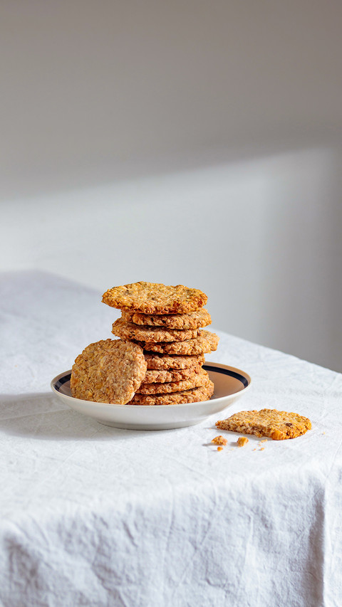 Stack of homemade oat cookies with shadows preview