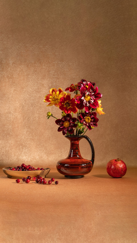 A bright bouquet of flowers in a clay jug preview