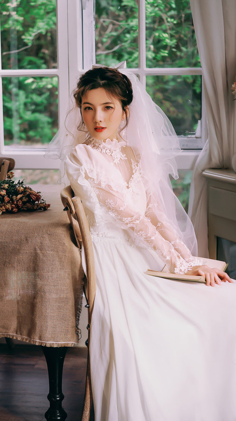 Girl in ancient wedding dress© HuangQiao preview
