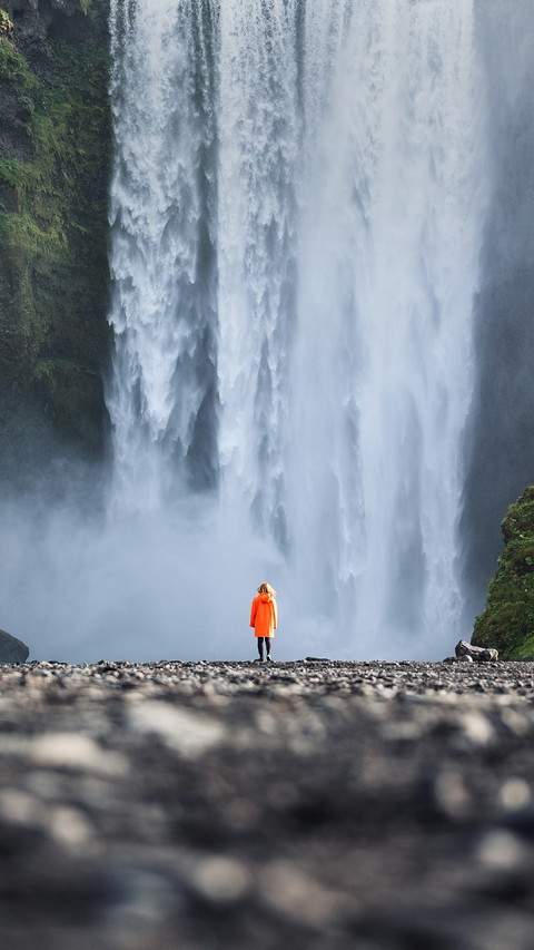 Woman Standing Alone Under The Waterfall preview
