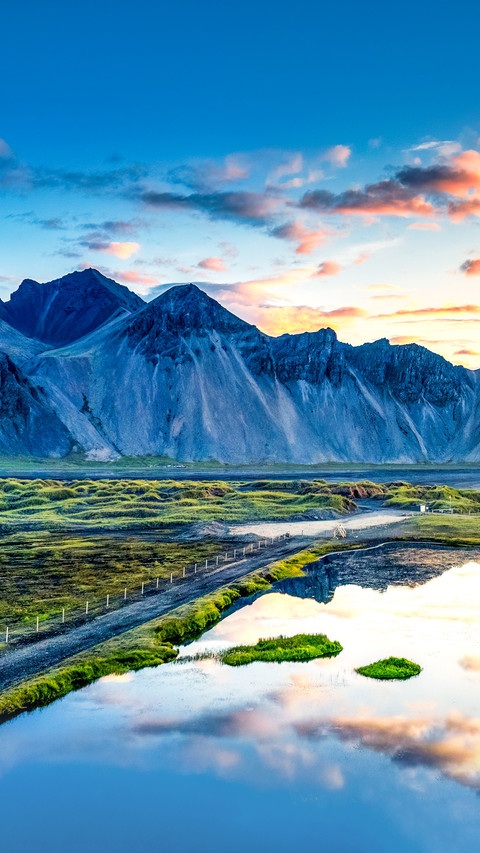 Majestic sunrise over Vestrahorn mountain with wilderness preview