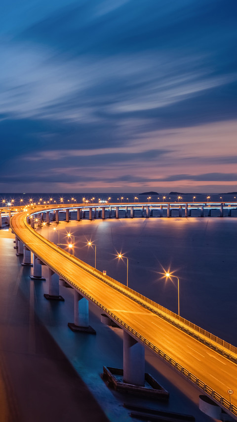Cross sea bridge at night preview