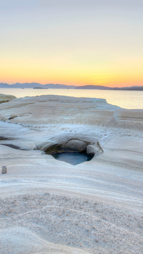 The white cliffs of Sarakiniko Beach at sunrise preview