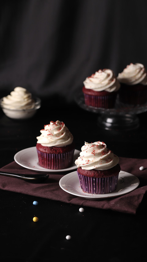 Cupcakes with whip cream vintage theme dark background preview
