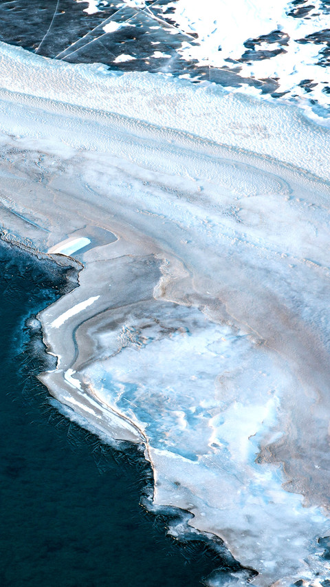 Aerial view of a frozen river in Mongolian winter landscape preview